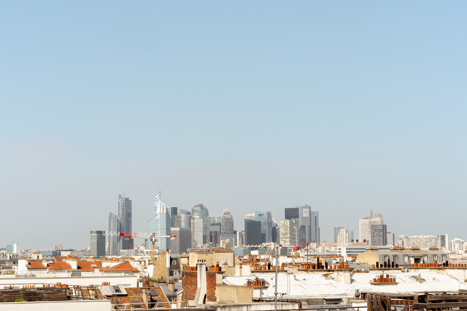 Terrasse avec vue dégagée sur les toits et La Défense